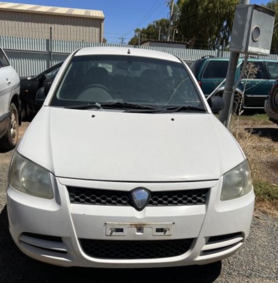 Impounded Vehicle: WHITE PROTON Registration: N/A