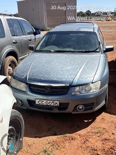 Impounded Vehicle: BLUE HOLDEN Registration: CCOO5K