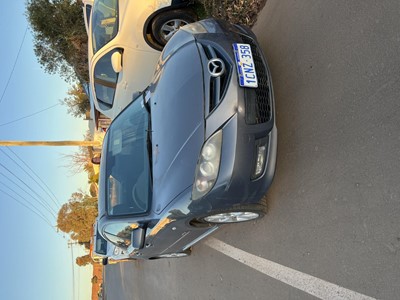 Impounded Vehicle: SILVER Mazda Registration: 1CNZ358