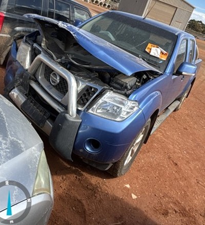 Impounded Vehicle: BLUE NISSAN Registration: N/A