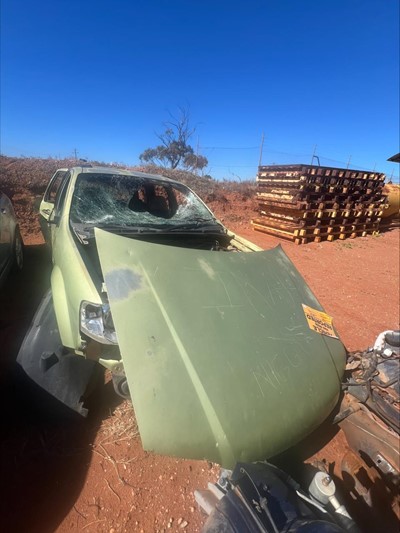 Impounded Vehicle: GREEN FORD Registration: N/A