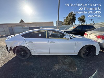 Impounded Vehicle: WHITE AUDI Registration: N/A