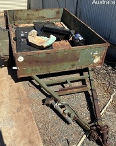 Impounded Vehicle: GREEN TRAILER Registration: N/A