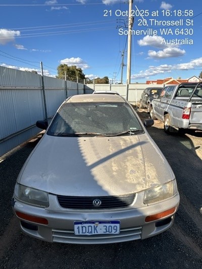 Impounded Vehicle: CHROME MAZDA Registration: 1DQK309