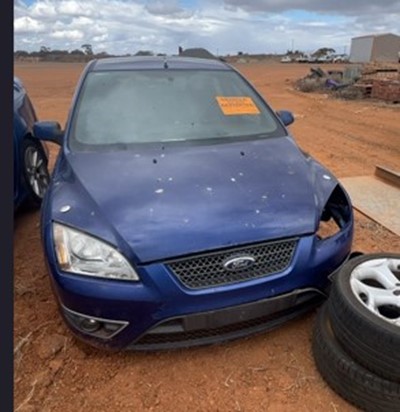 Impounded Vehicle: BLUE FORD Registration: N/A