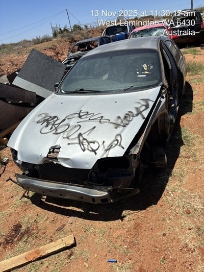 Impounded Vehicle: SILVER FORD Registration: N/A