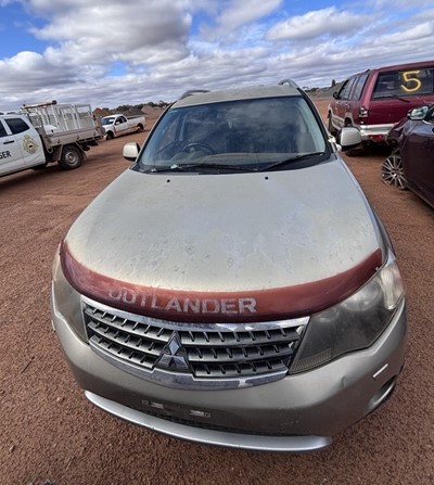 Impounded Vehicle: GOLD MITSUBISHI Registration: N/A
