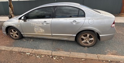 Impounded Vehicle: SILVER HONDA Registration: N/A