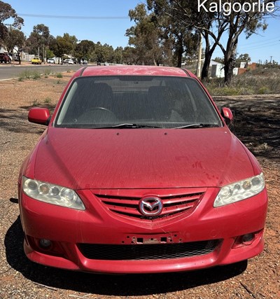 Impounded Vehicle: RED MAZDA Registration: N/A