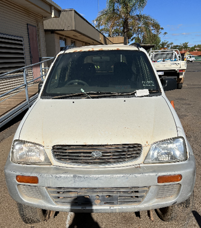 Impounded Vehicle: WHITE DAIHATSU Registration: NO