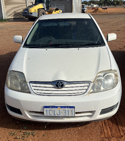 Impounded Vehicle: WHITE TOYOTA Registration: 1CJI311