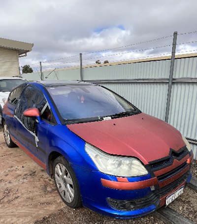 Impounded Vehicle: RED/BLUE CITRON Registration: 1CNY127