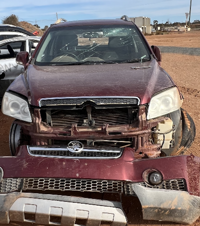 Impounded Vehicle: RED HOLDEN Registration: NO