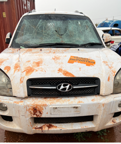 Impounded Vehicle: WHITE HYUNDAI Registration: N/A