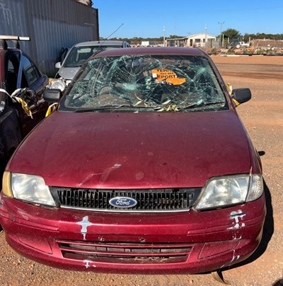 Impounded Vehicle: RED FORD Registration: N/A
