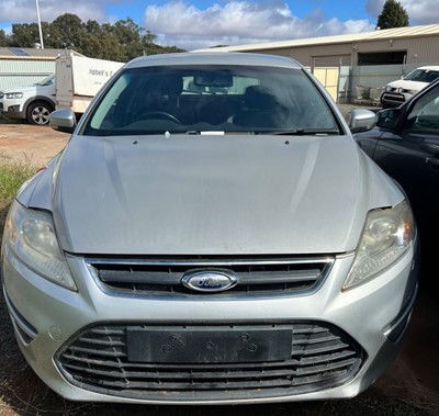 Impounded Vehicle: SILVER FORD Registration: N/A