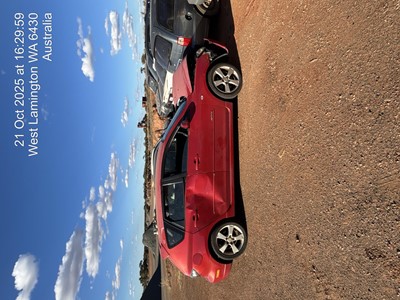 Impounded Vehicle: RED MAZDA Registration: 1GGT735