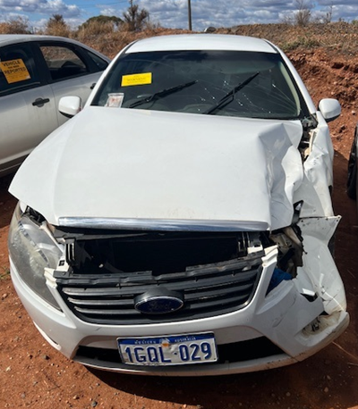 Impounded Vehicle: WHITE  FORD  Registration: 1GQL029