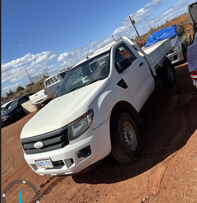 Impounded Vehicle: WHITE FORD Registration: 1DZS778