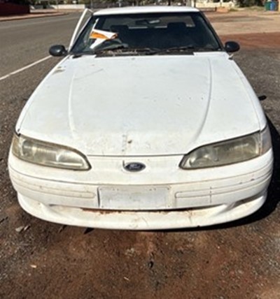 Impounded Vehicle: WHITE FORD Registration: N/A