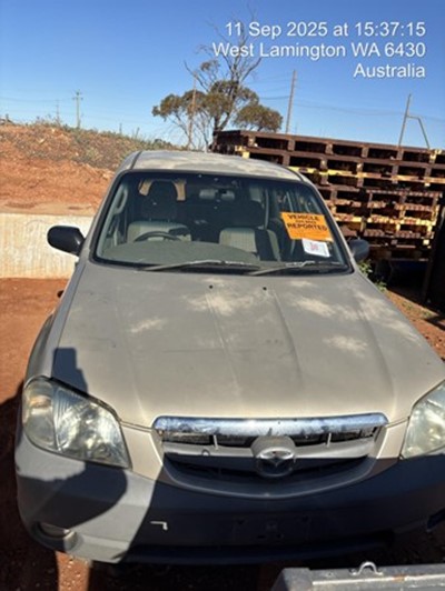 Impounded Vehicle: CHAMPAGNE MAZDA Registration: N/A