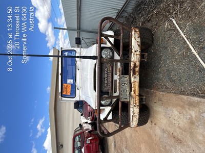 Impounded Vehicle: WHITE TOYOTA Registration: 7IB917