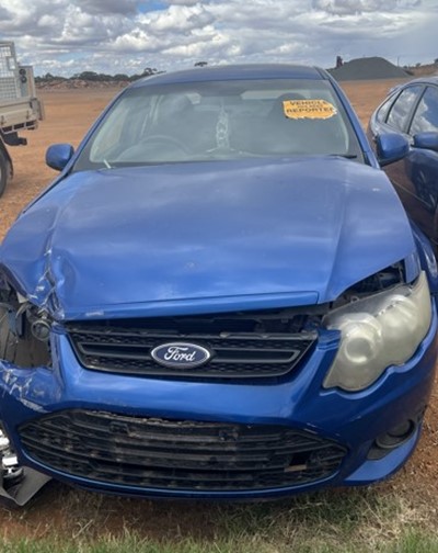 Impounded Vehicle: BLUE FORD Registration: N/A