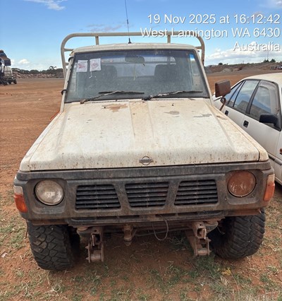 Impounded Vehicle: WHITE NISSAN Registration: KBC345E