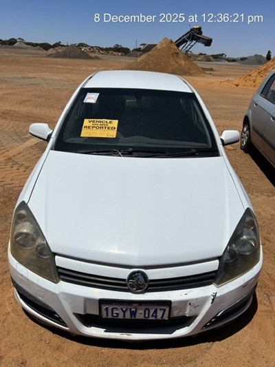 Impounded Vehicle: WHITE HOLDEN Registration: 1GYW057