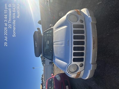 Impounded Vehicle: SILVER JEEP Registration: N/A
