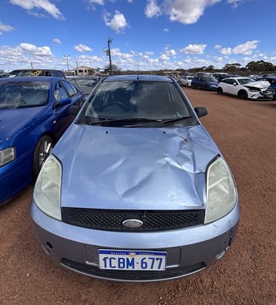 Impounded Vehicle: SILVER FORD Registration: 1CBM677