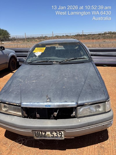 Impounded Vehicle: GREEN FORD Registration: N/A