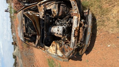 Impounded Vehicle: BURNT FORD Registration: N/A