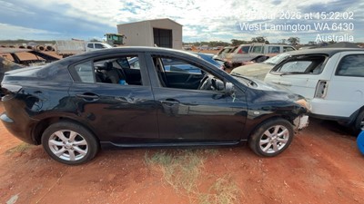 Impounded Vehicle: BLACK MAZDA Registration: 1HUZ114