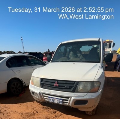 Impounded Vehicle: WHITE MITSUBISHI Registration: 1EQT370
