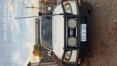 Impounded Vehicle: WHITE FORD Registration: 1DLQ387