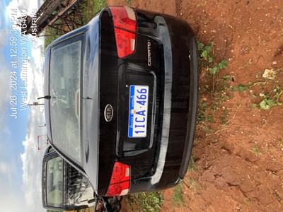 Impounded Vehicle: BLACK KIA Registration: 1ICA466