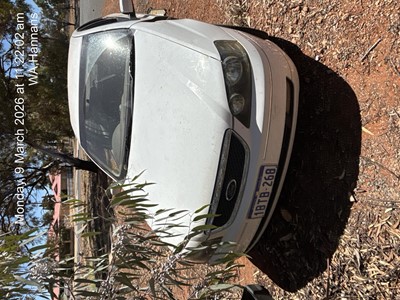 Impounded Vehicle: WHITE FORD Registration: 1BTB268