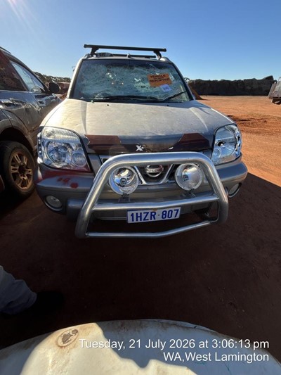 Impounded Vehicle: SILVER NISSAN  Registration: NONE