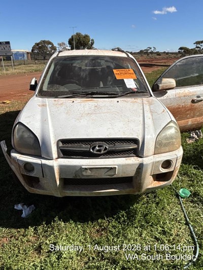 Impounded Vehicle: WHITE HYUNDAI Registration: NONE