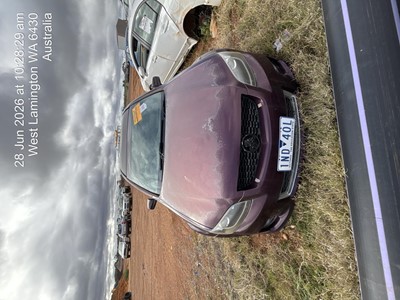 Impounded Vehicle: BURGUNDY HOLDEN Registration: 1ND40L