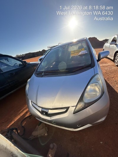 Impounded Vehicle: SILVER HONDA Registration: NONE