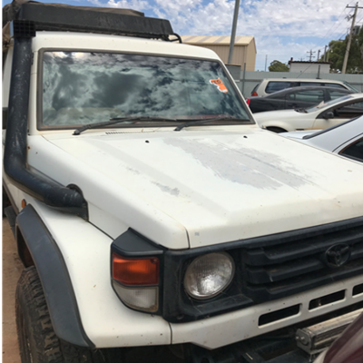 Impounded Vehicle: White Toyota Registration: KBC276P