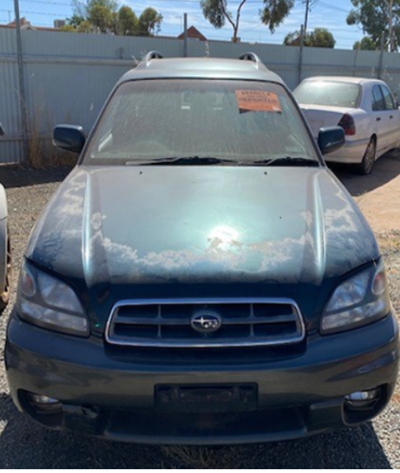 Impounded Vehicle: Green Subaru Registration: N/A
