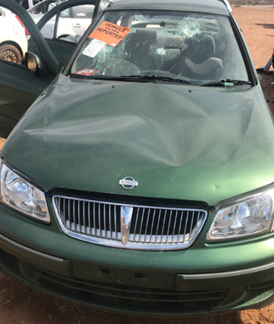 Impounded Vehicle: Green Nissan Registration: 1CEY990