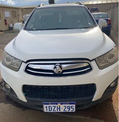 Impounded Vehicle: White Holden Registration: 