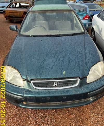 Impounded Vehicle: GREEN HONDA Registration: N/A