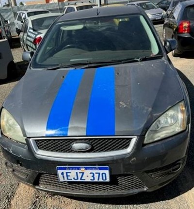 Impounded Vehicle: Blue FORD Registration: 