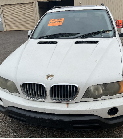 Impounded Vehicle: White BMW Registration: No